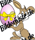 Ostern: Hase - prsentiert Osterei (pink mit Schleife) (nicht animiert)