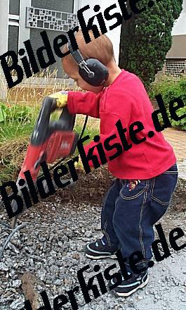 Child working with a drill hammer