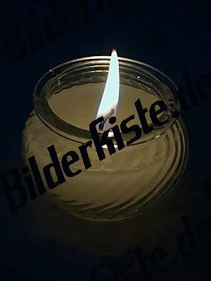 Candle in a glass burning