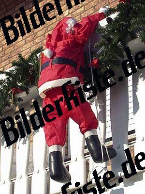 Babbo Natale che sale dal balcone