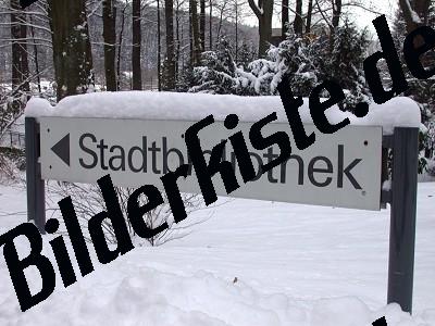 signpost covered with snow