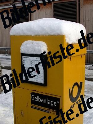 Postbox with snow on it