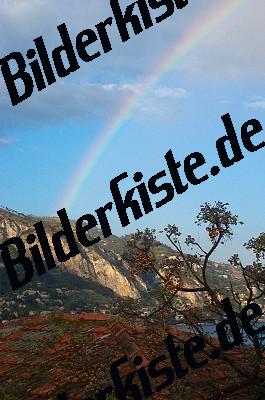 Rainbow behind a mountain