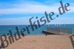 Beach and sea under blue sky