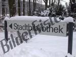 signpost covered with snow