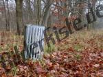 Garbage can on a meadow