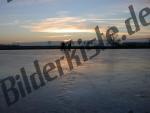 Ice skating on a lake