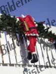 Christmas decoration santa claus on roof