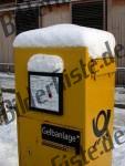 Postbox with snow on it