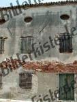 Besch�digte Hauswand